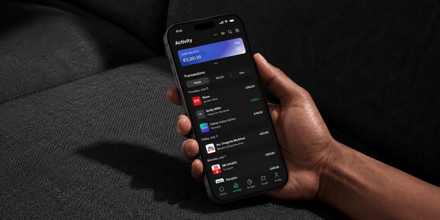 Grava Activity screen on a phone held in hand over a dark sofa